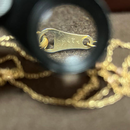 Agate K10 long necklace 40 cm with several cutpole points and faint brand engraving, gently used