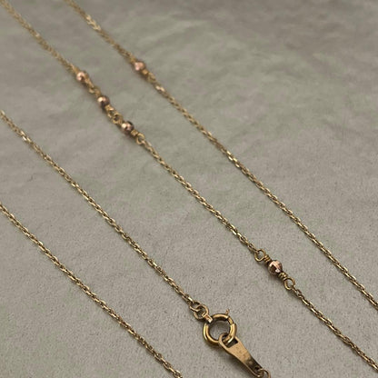 Agate K10 long necklace 40 cm with several cutpole points and faint brand engraving, gently used