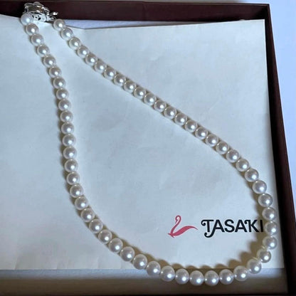 Tasaki pearl necklace featuring 7mm Akoya pearls with 42.5cm princess length and silver clasp