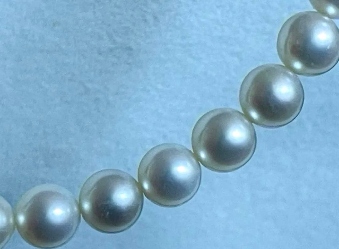 Tasaki pearl necklace featuring 7mm Akoya pearls with 42.5cm princess length and silver clasp