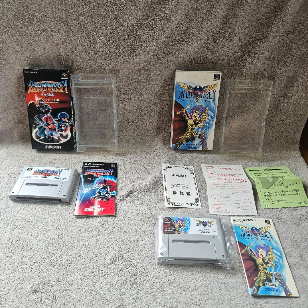 SNES Albert Odyssey 1 and 2 Set game cartridges with original labels for RPG titles by Sunsoft