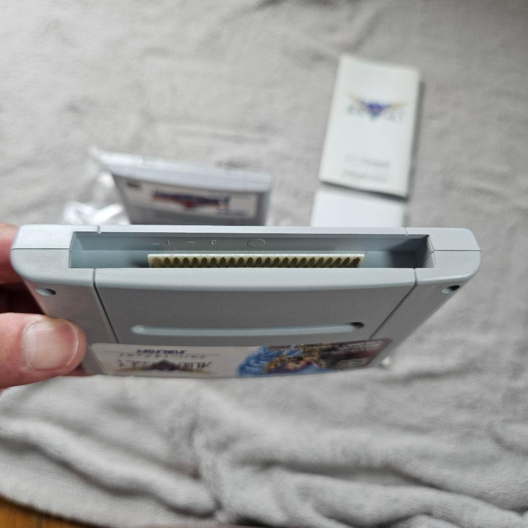 SNES Albert Odyssey 1 and 2 Set game cartridges with original labels for RPG titles by Sunsoft