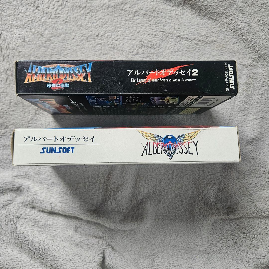 SNES Albert Odyssey 1 and 2 Set game cartridges with original labels for RPG titles by Sunsoft