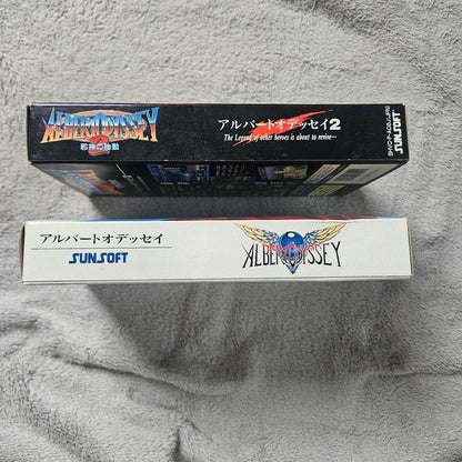 SNES Albert Odyssey 1 and 2 Set game cartridges with original labels for RPG titles by Sunsoft