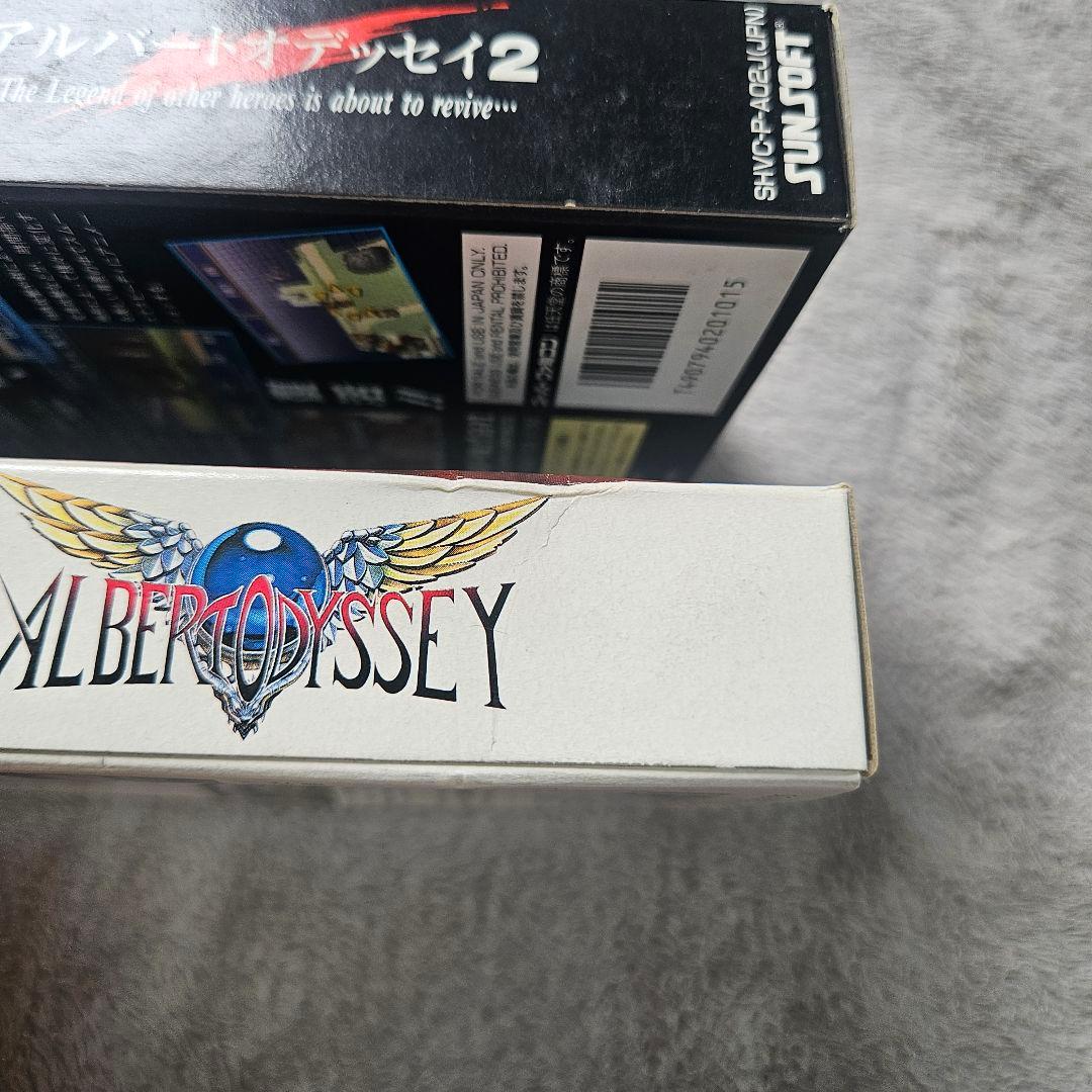 SNES Albert Odyssey 1 and 2 Set game cartridges with original labels for RPG titles by Sunsoft