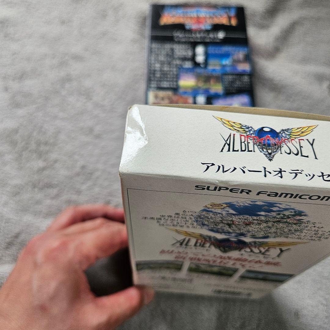 SNES Albert Odyssey 1 and 2 Set game cartridges with original labels for RPG titles by Sunsoft