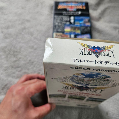 SNES Albert Odyssey 1 and 2 Set game cartridges with original labels for RPG titles by Sunsoft
