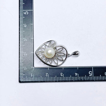 MIKIMOTO Pearl Necklace Pendant Top featuring a 7.2mm pearl set in silver with total weight 2.7g