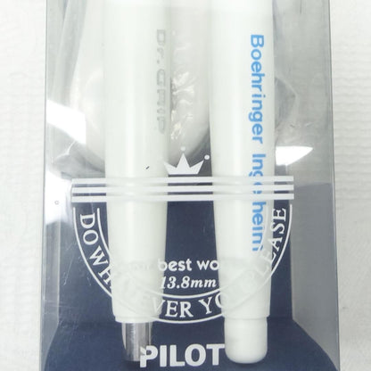 Dr.GRIP initial model ballpoint pen and mechanical pencil set with black desk stand on white background