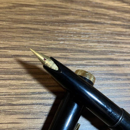 Pilot Black Cap Fountain Pen with black body and gold-plated nib and tip shown on white background