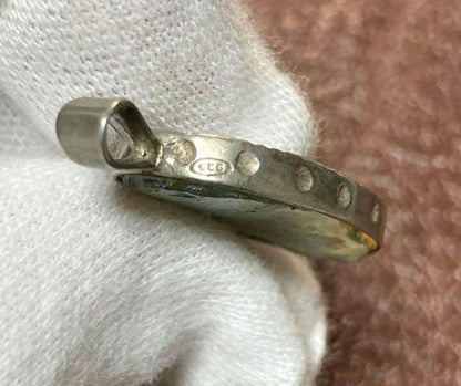 Silver pendant top with ancient Roman glass exhibiting an opal-like effect, measuring 1.3 cm by 2.5 cm