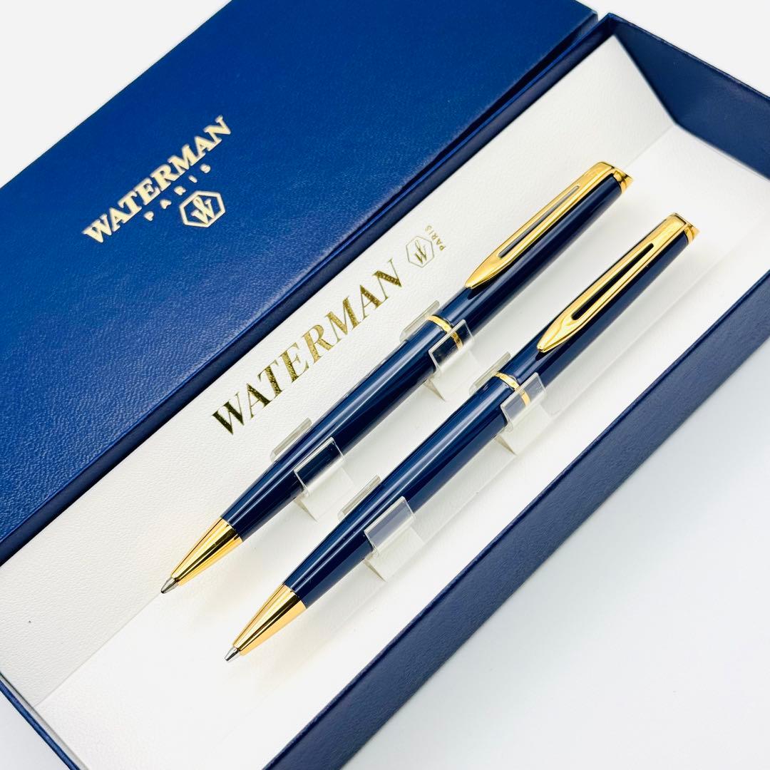 Waterman pen set featuring navy and gold ballpoint pen and mechanical pencil with original French case
