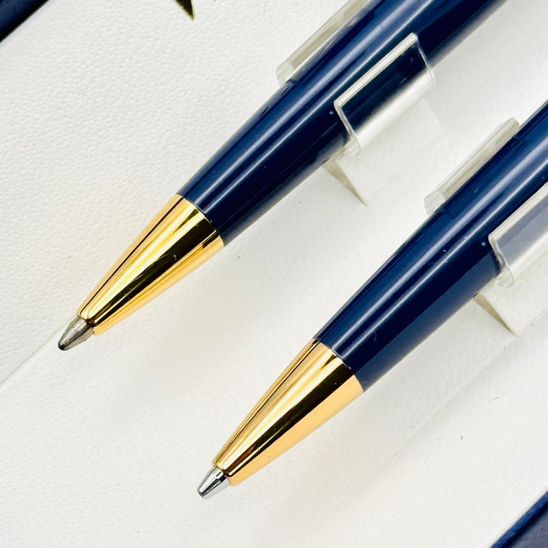 Waterman pen set featuring navy and gold ballpoint pen and mechanical pencil with original French case