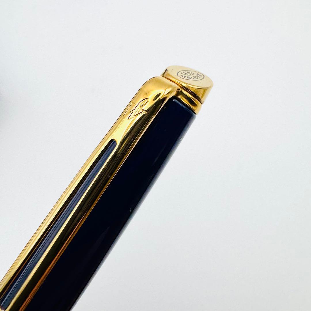 Waterman pen set featuring navy and gold ballpoint pen and mechanical pencil with original French case