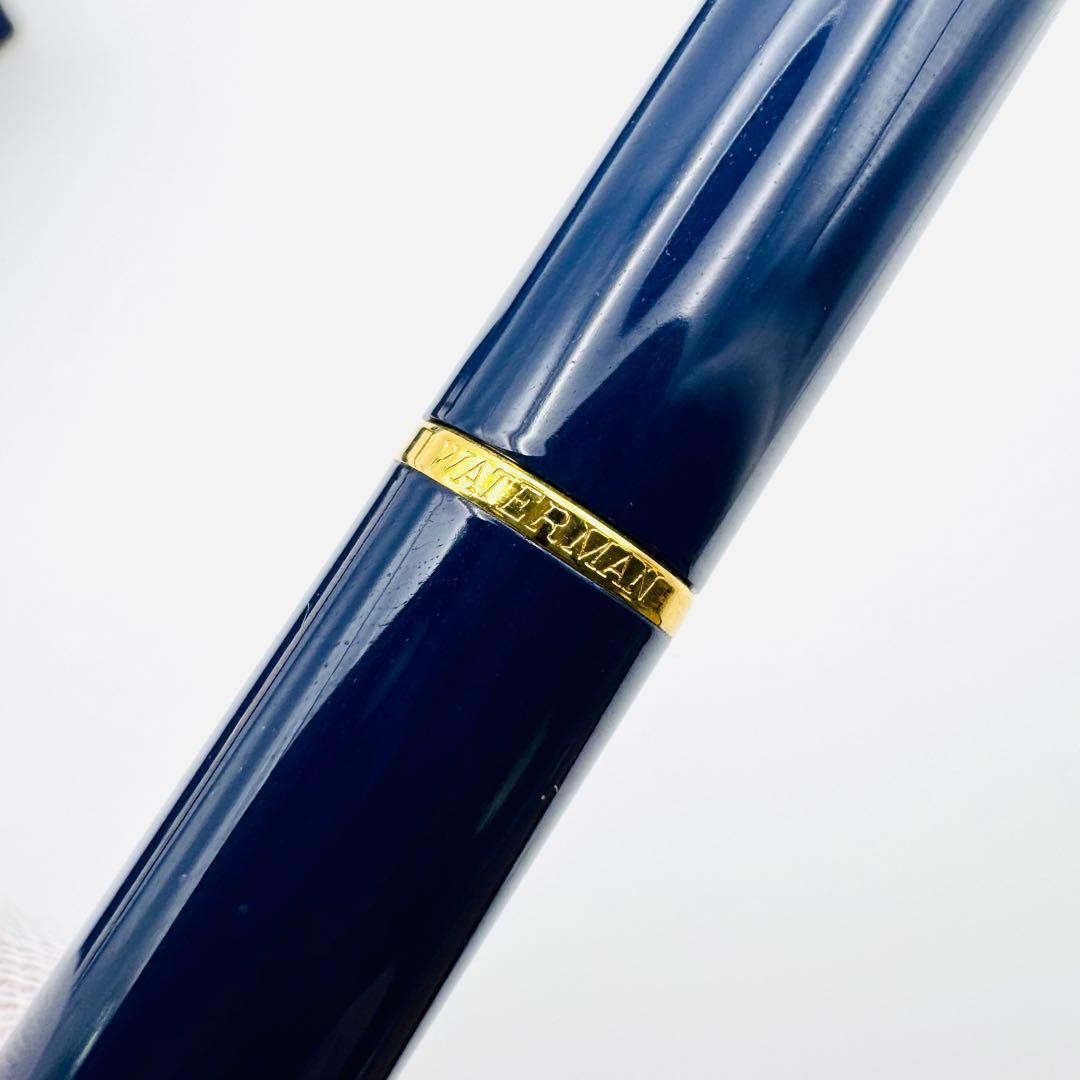 Waterman pen set featuring navy and gold ballpoint pen and mechanical pencil with original French case