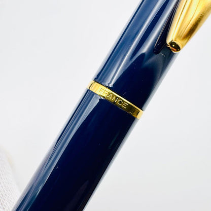 Waterman pen set featuring navy and gold ballpoint pen and mechanical pencil with original French case