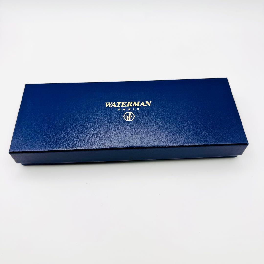 Waterman pen set featuring navy and gold ballpoint pen and mechanical pencil with original French case
