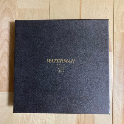 Waterman Expert City Line ballpoint pen in Urban Brown with included pen case, shown slightly scuffed