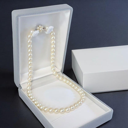 Highest Peak Tasaki Akoya pearl necklace with 7.5-8 mm round pearls on a silver chain, 42 cm length