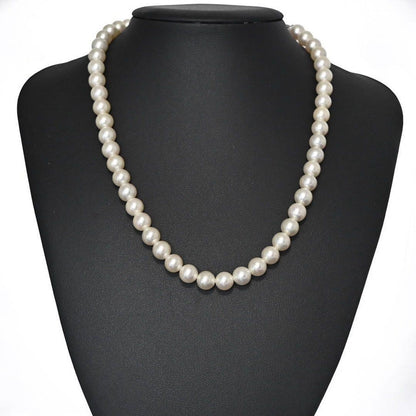 Highest Peak Tasaki Akoya pearl necklace with 7.5-8 mm round pearls on a silver chain, 42 cm length
