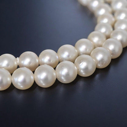 Highest Peak Tasaki Akoya pearl necklace with 7.5-8 mm round pearls on a silver chain, 42 cm length