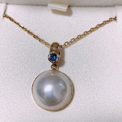 Tasaki Pearl Sapphire Necklace in 18K Yellow Gold with 60cm chain and 25mm x 14.5mm pendant
