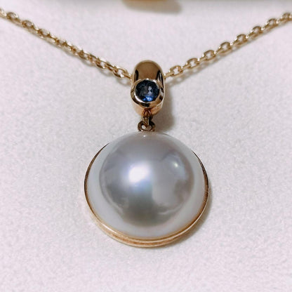 Tasaki Pearl Sapphire Necklace in 18K Yellow Gold with 60cm chain and 25mm x 14.5mm pendant