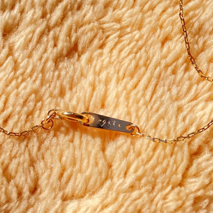 agete 10K gold necklace with three strands featuring blue turquoise and tanzanite stones