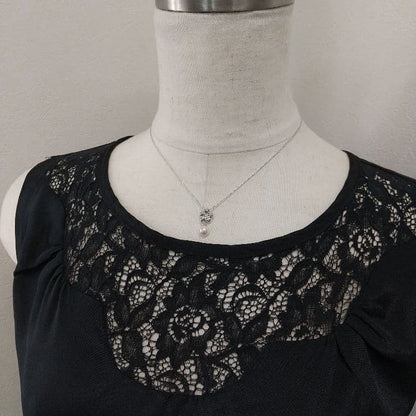 Law pearl necklace with 6.4mm pearl on a 40cm chain displayed on a white background