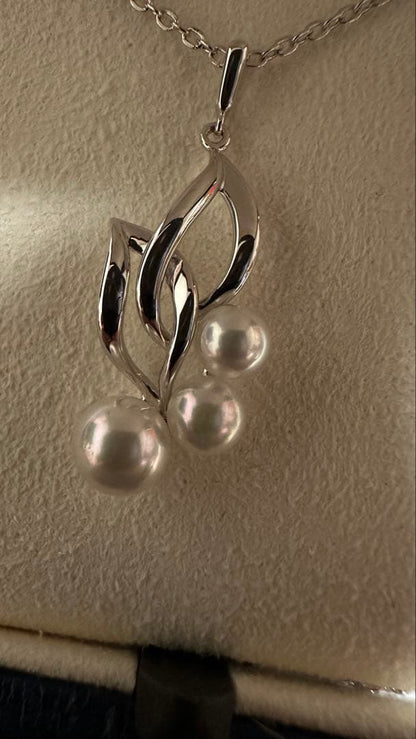 Mikimoto Sv Akoya Cultured Pearl Necklace with 6mm round white pearls on a silver chain
