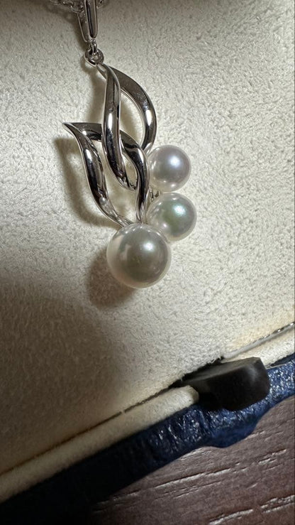 Mikimoto Sv Akoya Cultured Pearl Necklace with 6mm round white pearls on a silver chain