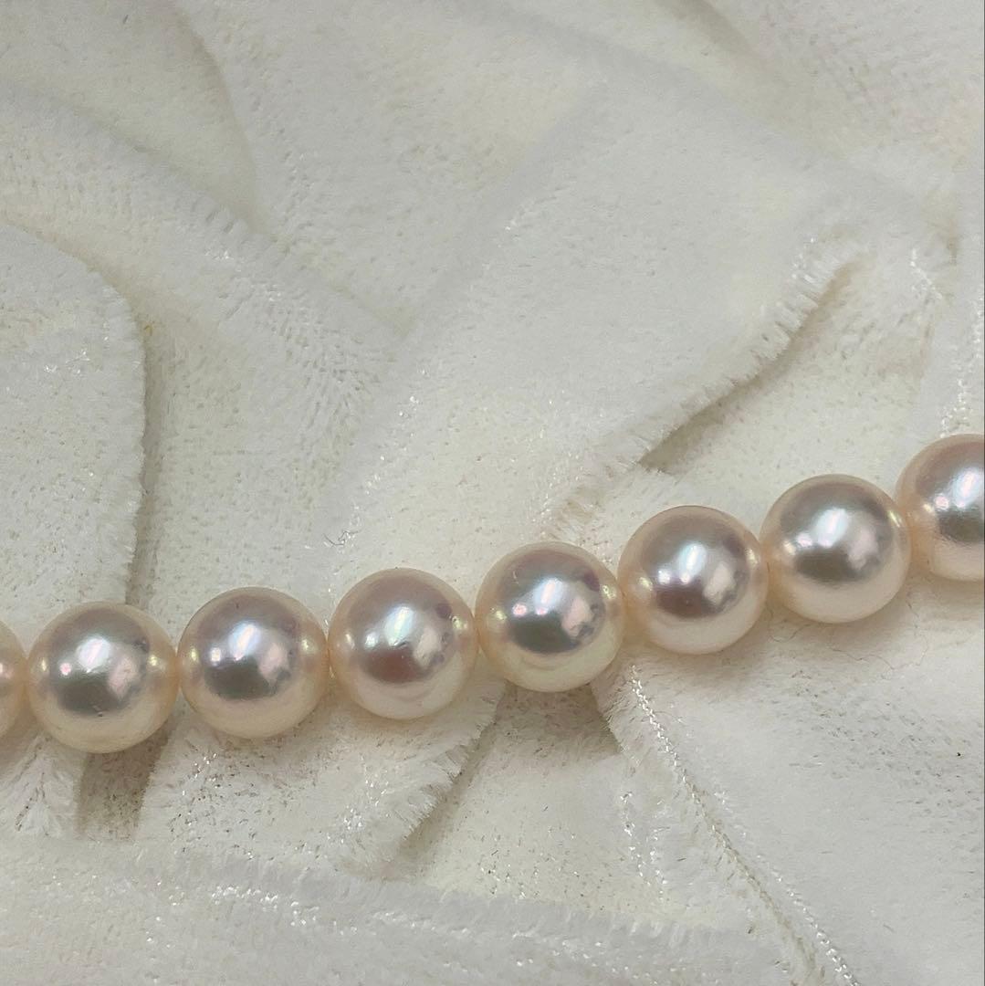Akoya pearl necklace featuring 7.06mm pearls, six rubies, and a K14WG clasp on a 43cm chain