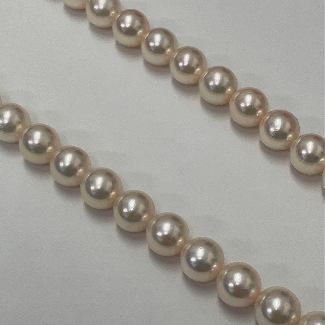 Akoya pearl necklace featuring 7.06mm pearls, six rubies, and a K14WG clasp on a 43cm chain