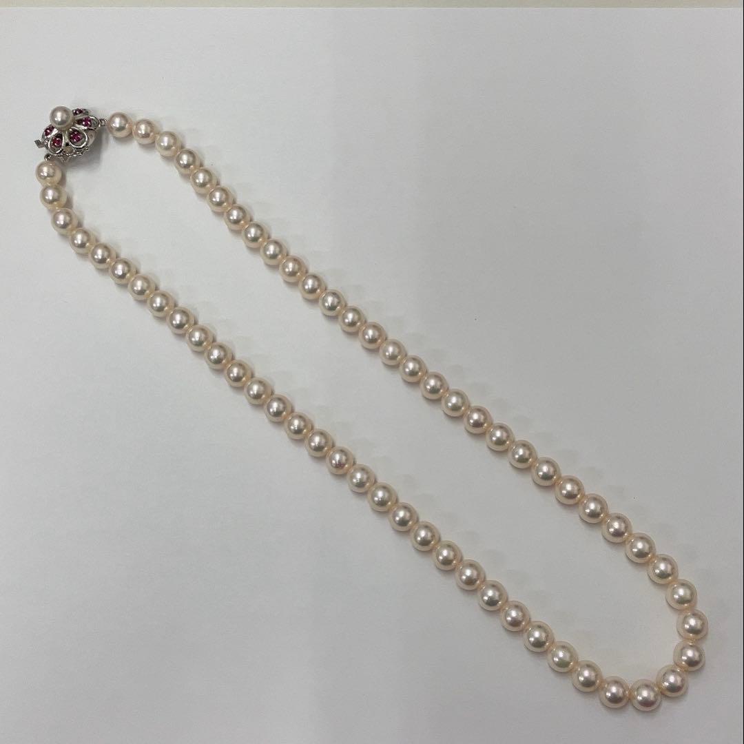 Akoya pearl necklace featuring 7.06mm pearls, six rubies, and a K14WG clasp on a 43cm chain