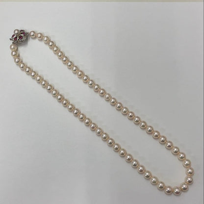 Akoya pearl necklace featuring 7.06mm pearls, six rubies, and a K14WG clasp on a 43cm chain