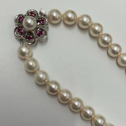 Akoya pearl necklace featuring 7.06mm pearls, six rubies, and a K14WG clasp on a 43cm chain