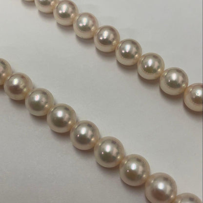 Akoya pearl necklace featuring 7.06mm pearls, six rubies, and a K14WG clasp on a 43cm chain
