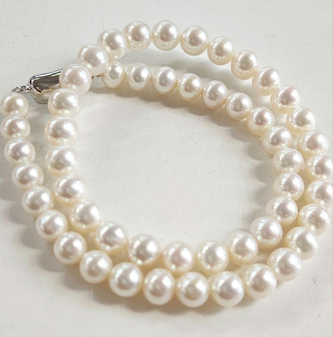 Akoya genuine pearl necklace featuring 8mm round beads and 42cm length on a white background