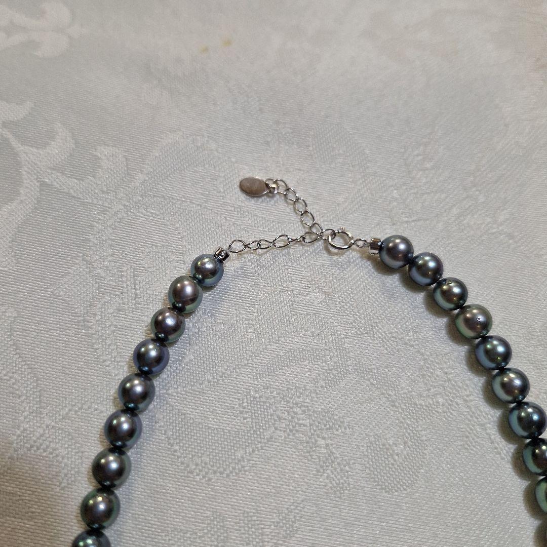 Akoya 6mm pearl Tahitian color necklace 37cm with matching titanium earrings displayed on white background