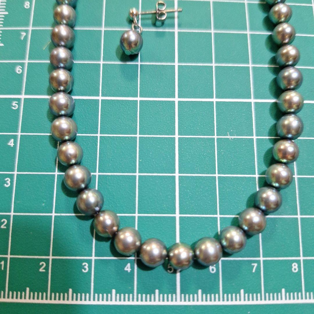 Akoya 6mm pearl Tahitian color necklace 37cm with matching titanium earrings displayed on white background