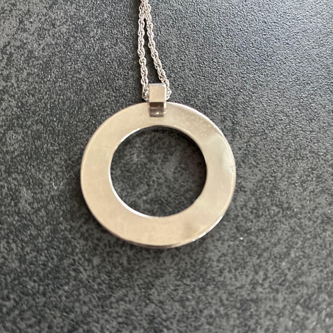 MIKIMOTO silver Circle Logo Necklace with 3 cm diameter pendant on a delicate chain