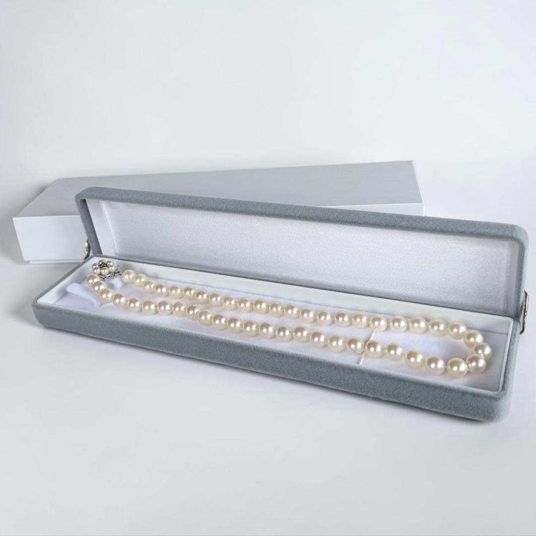 Takasaki K14 Akoya pearl necklace featuring 8mm pearls and sapphire flower pendant