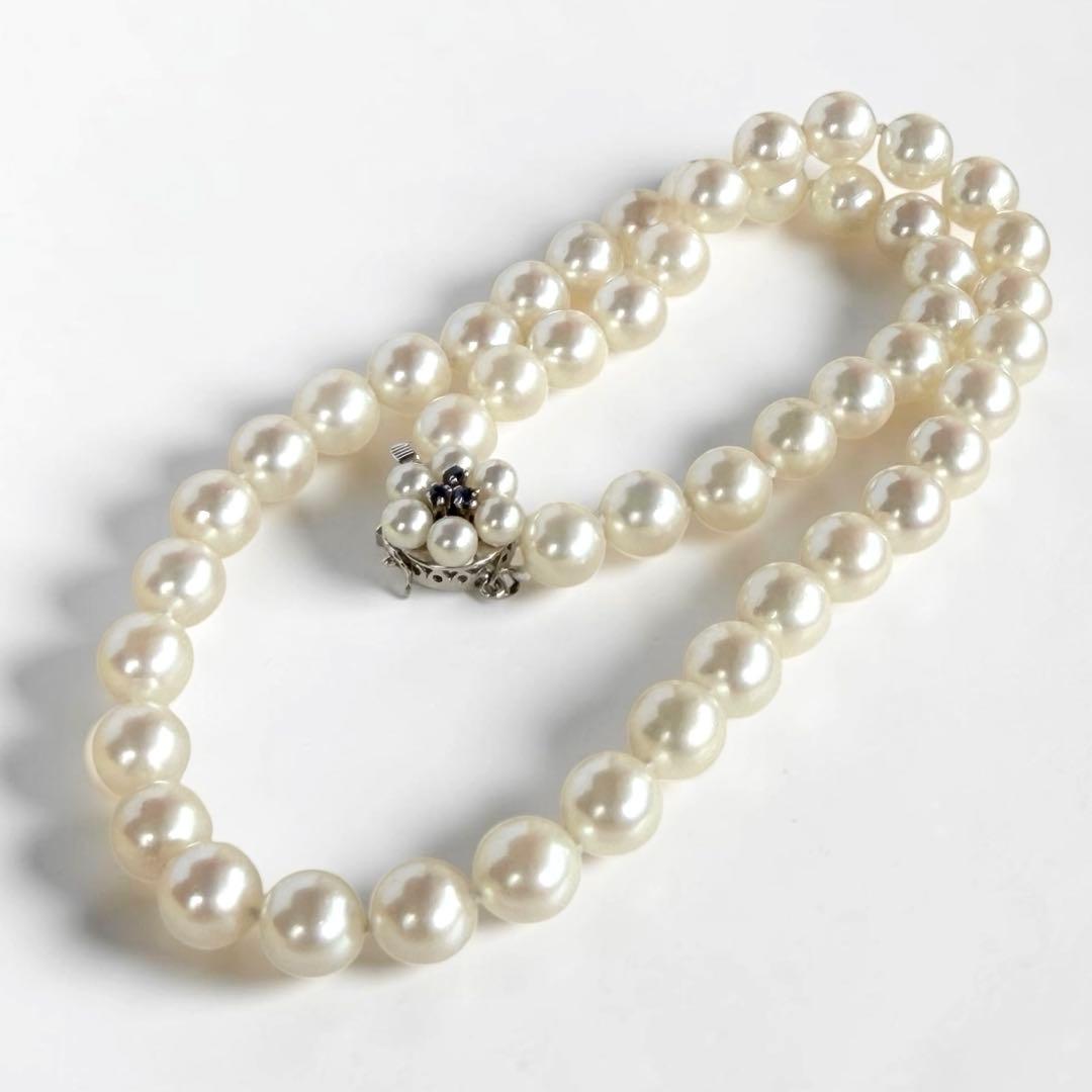 Takasaki K14 Akoya pearl necklace featuring 8mm pearls and sapphire flower pendant