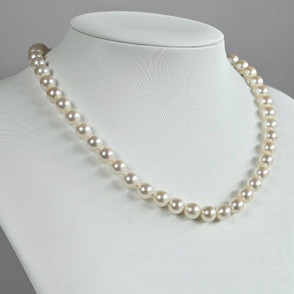 Takasaki K14 Akoya pearl necklace featuring 8mm pearls and sapphire flower pendant