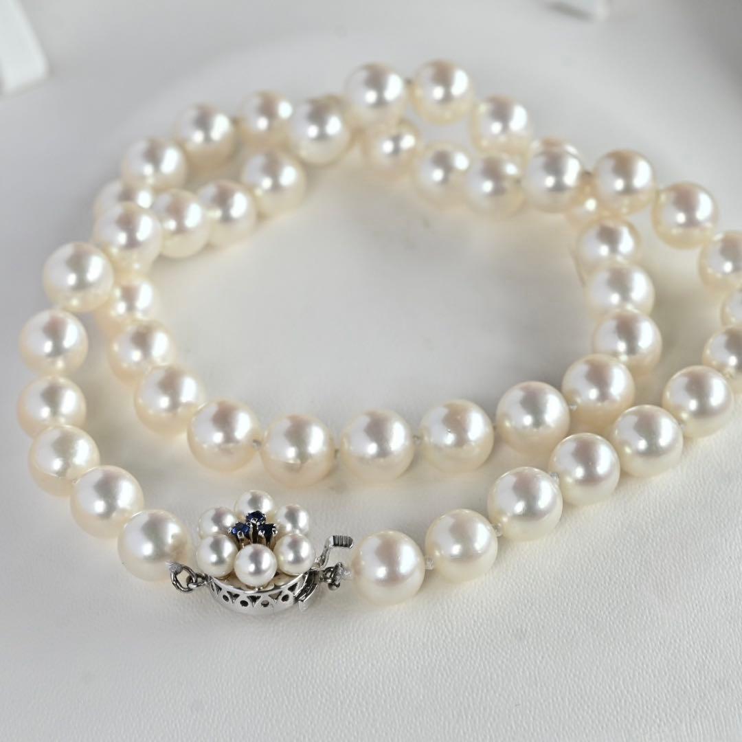 Takasaki K14 Akoya pearl necklace featuring 8mm pearls and sapphire flower pendant