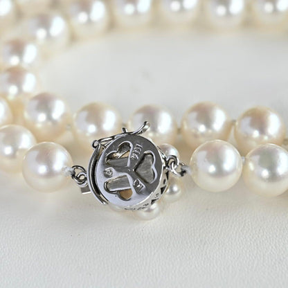 Takasaki K14 Akoya pearl necklace featuring 8mm pearls and sapphire flower pendant