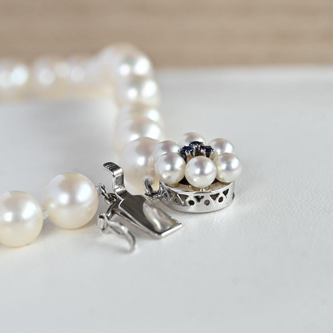 Takasaki K14 Akoya pearl necklace featuring 8mm pearls and sapphire flower pendant
