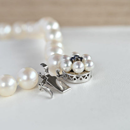 Takasaki K14 Akoya pearl necklace featuring 8mm pearls and sapphire flower pendant