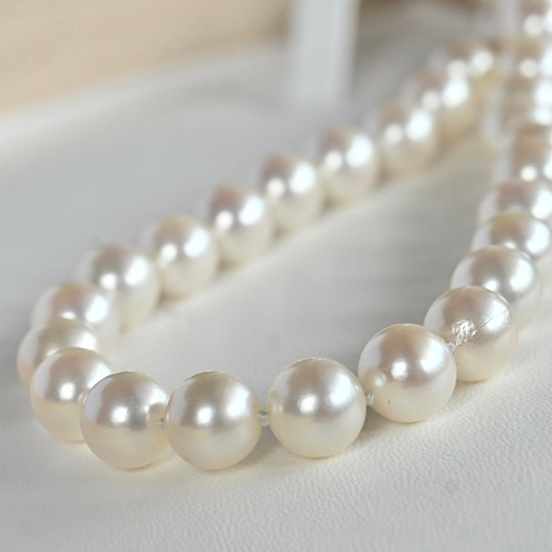 Takasaki K14 Akoya pearl necklace featuring 8mm pearls and sapphire flower pendant