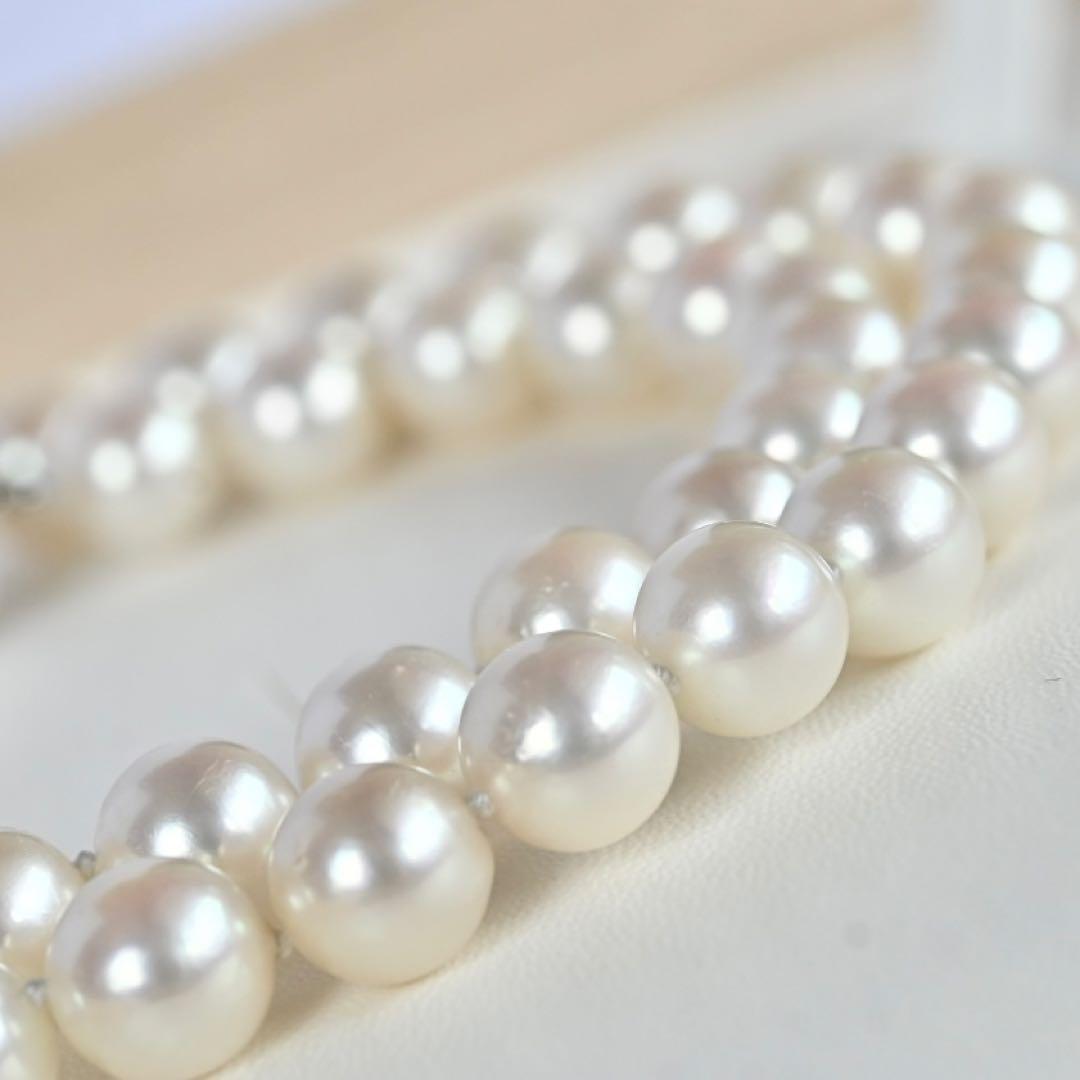 Takasaki K14 Akoya pearl necklace featuring 8mm pearls and sapphire flower pendant